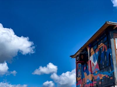 A Building With A Mural On The Side Of It