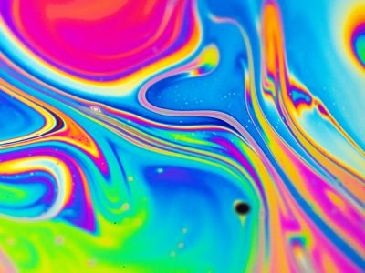 A Close Up Of A Colorful Wave