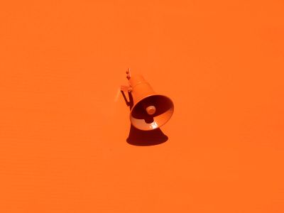 Orange Megaphone On Orange Wall