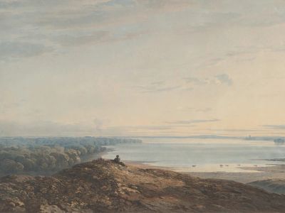 Person Sitting On Rock Near Sea During Daytime