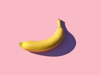 Riped Banana On Pink Surface
