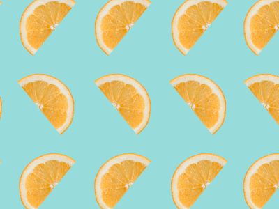 Sliced Orange Fruits On White Background
