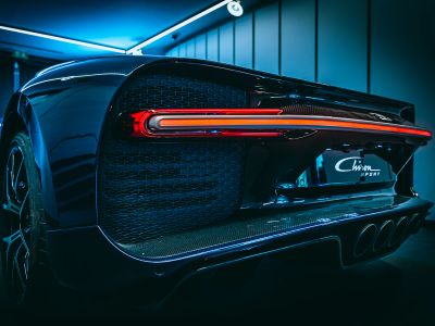 Black Car With Red And White License Plate