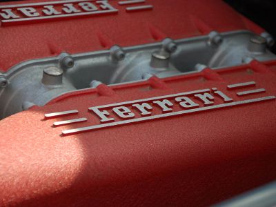 Close Up Photography Of Gray And Red Ferrari Engine