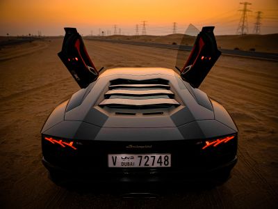 Closeup Photo Of Gray Coupe On Desert