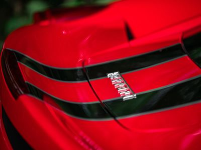 Red And Black Car In Close Up Photography