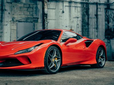 Red Ferrari 458 Italia Parked Near Gray Building