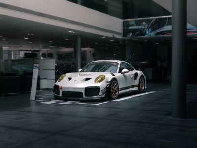White Bmw M 3 Coupe Parked In Building
