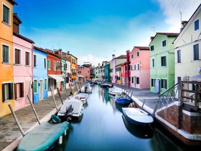 Boats On Canal Between Houses During Daytime