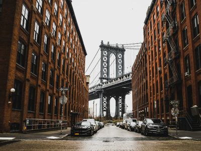 Cars Parked Near Brown Building
