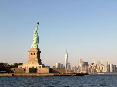 Person Taking Photo Of Statue Of Liberty