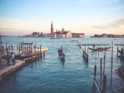 Photography Of Of People Near Boat During Daytime