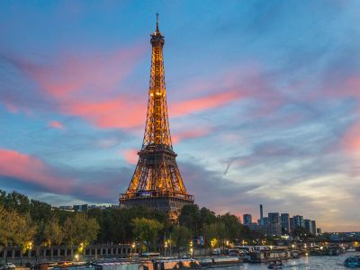 The Eiffel Tower Is Lit Up At Night