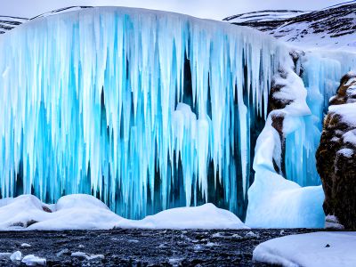 A Large Glacier In The Snow