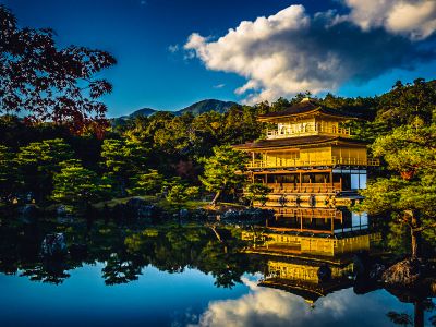 Pagoda House Near Body Of Water During Daytime
