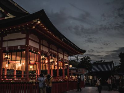 People Standing In Front Of Pagoda